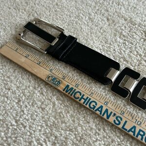 Black patent leather belt with silver hardware, size small